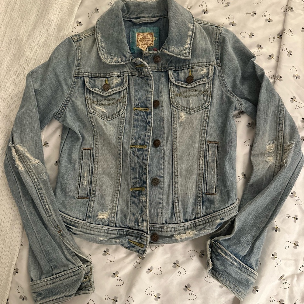 Early Y2K distressed vintage light blue denim jacket
